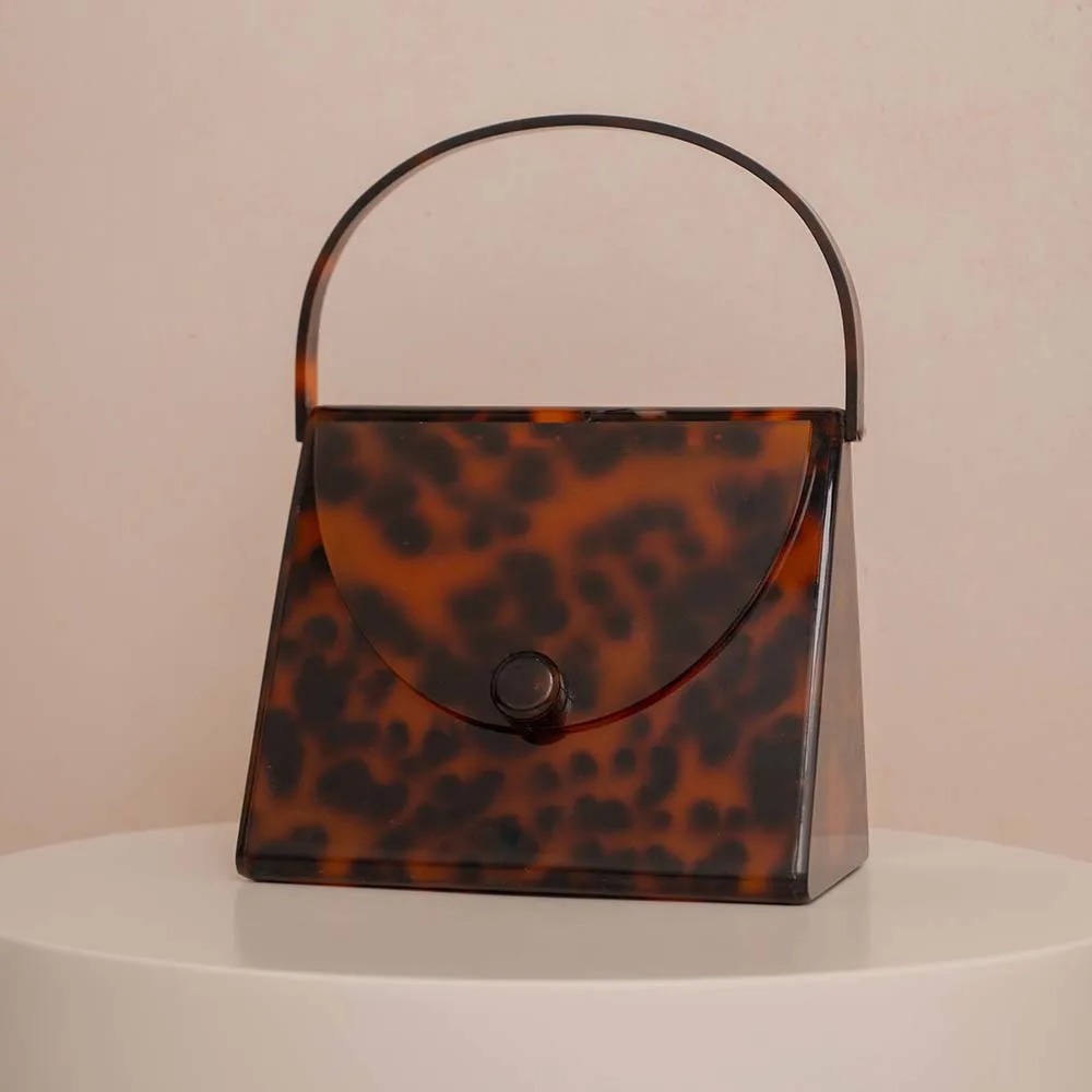 Nieuwe aanwinst: glanzende ret - Tortoiseshell Bag Acrylic recensie en prijs